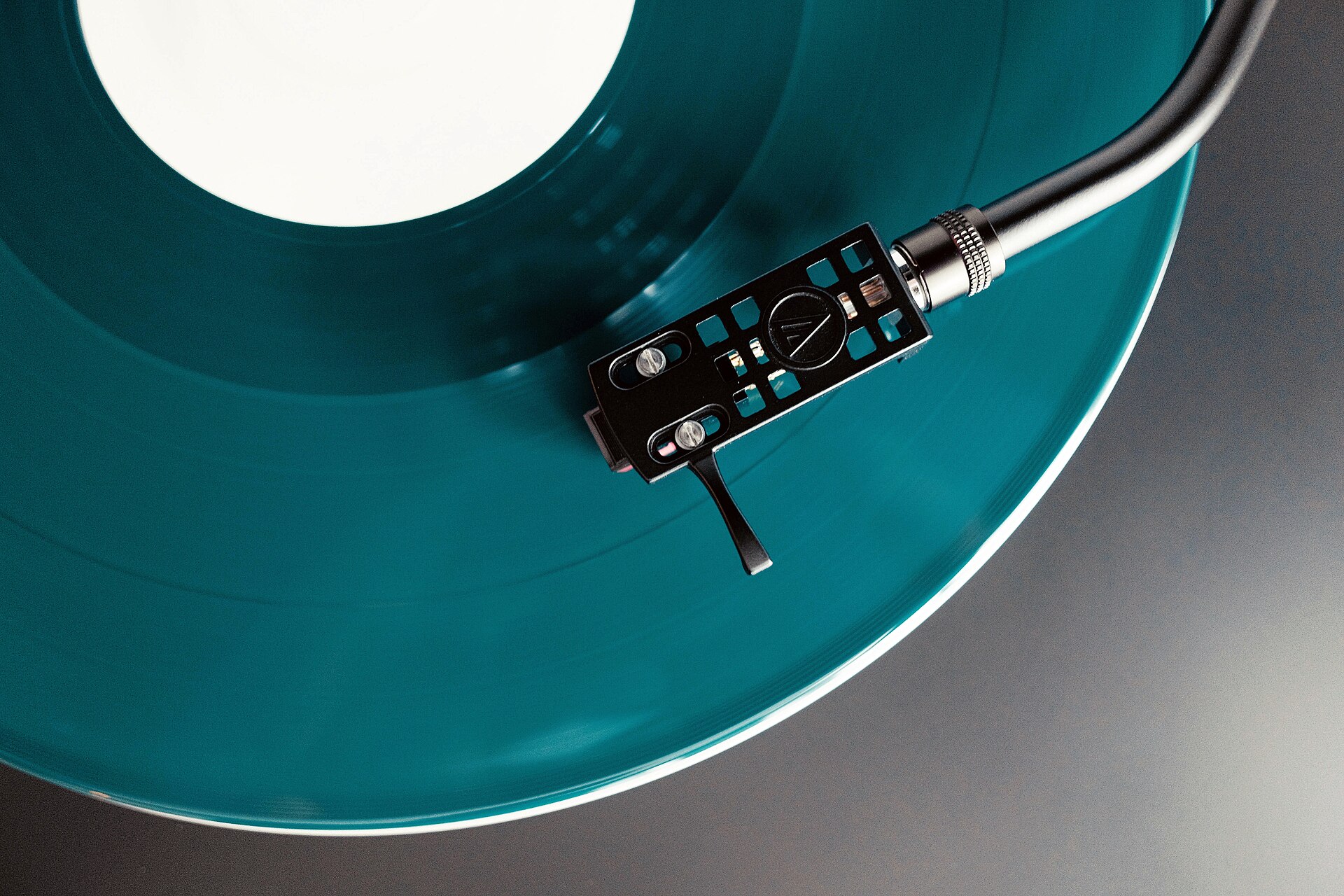 Colored vinyl record playing on a turntable
