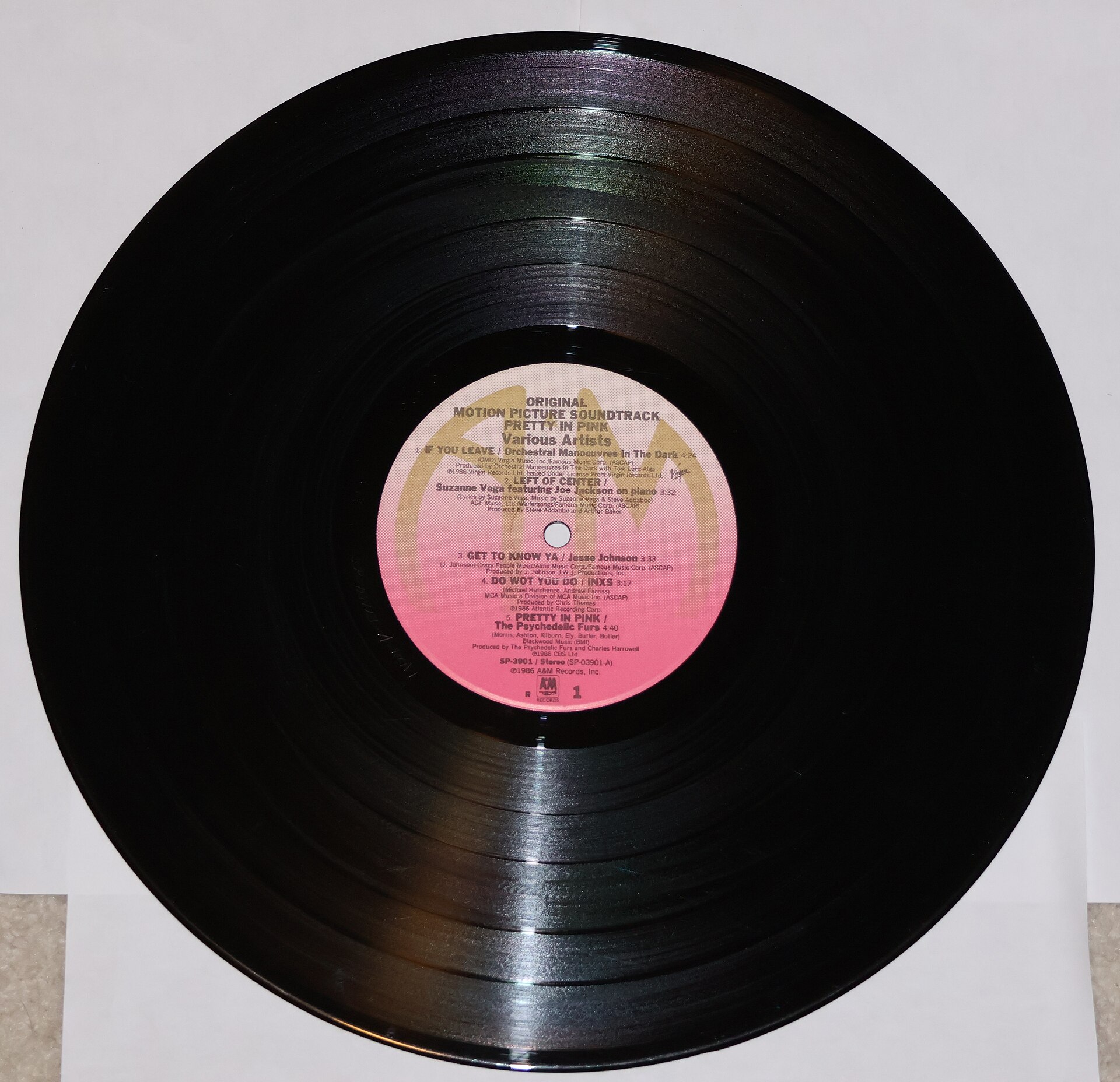 Close-up of a vinyl record label, showing the label brand, catalog number, and copyright information