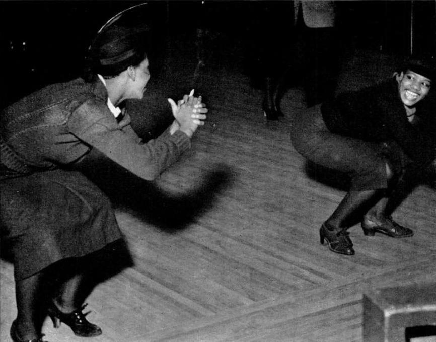 Dancers at the Savoy Ballroom in Harlem, New York, 1936. Photographer unknown, public domain, via Wikimedia Commons.