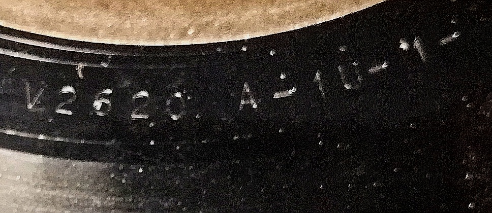 Close-up of runout etchings on a vinyl record